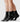 Swedish Stockings Billy svarta ankelstrumpor på två par ben, för att förstärka att det säljs i 2-pack, strumporna är i veganskt material och har en ribbad textur och en bred mudd.